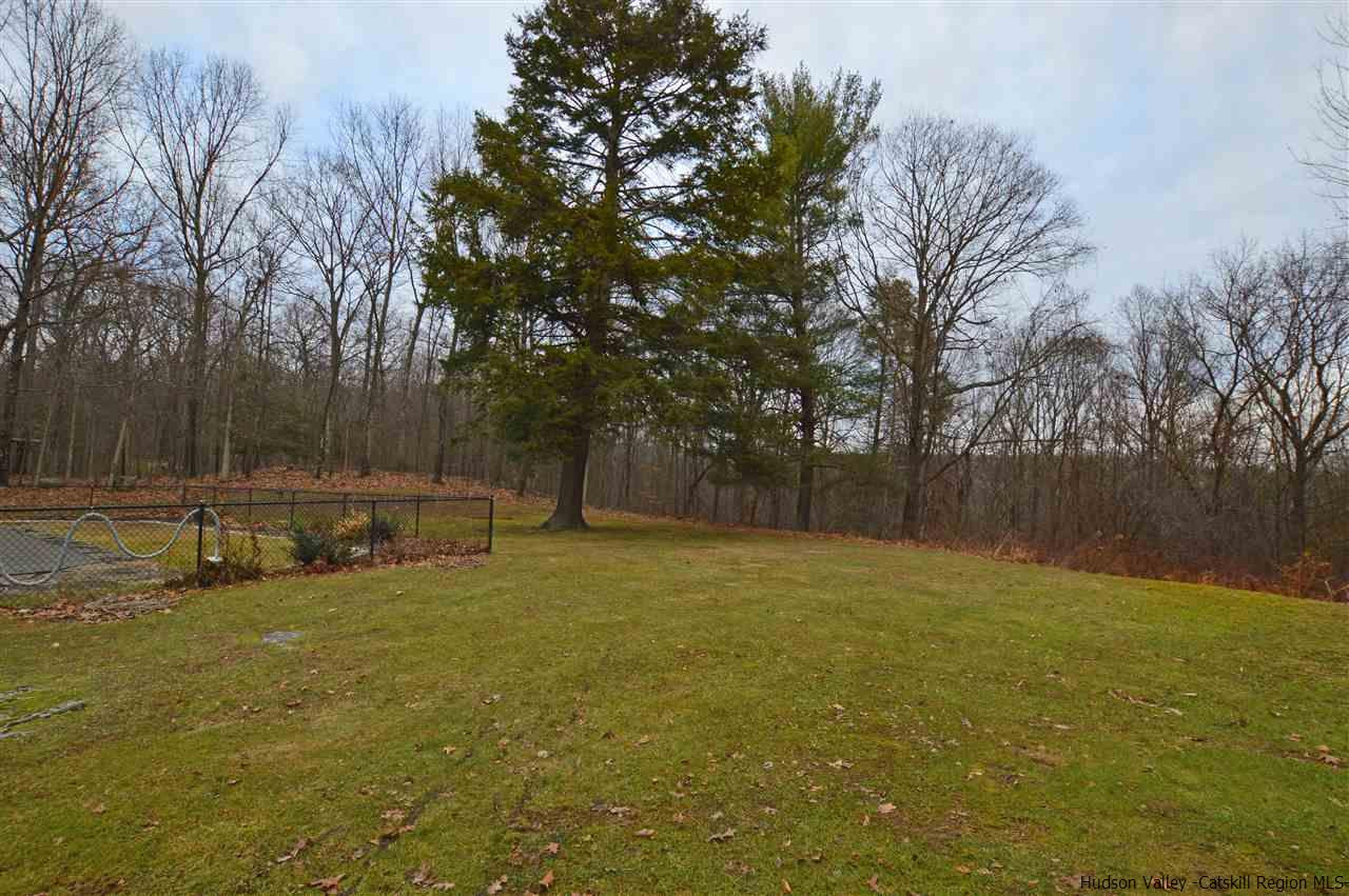 47 Roxanne Boulevard Highland, NY 12528 - Photo 24 of 24 a view of a field with trees in the background