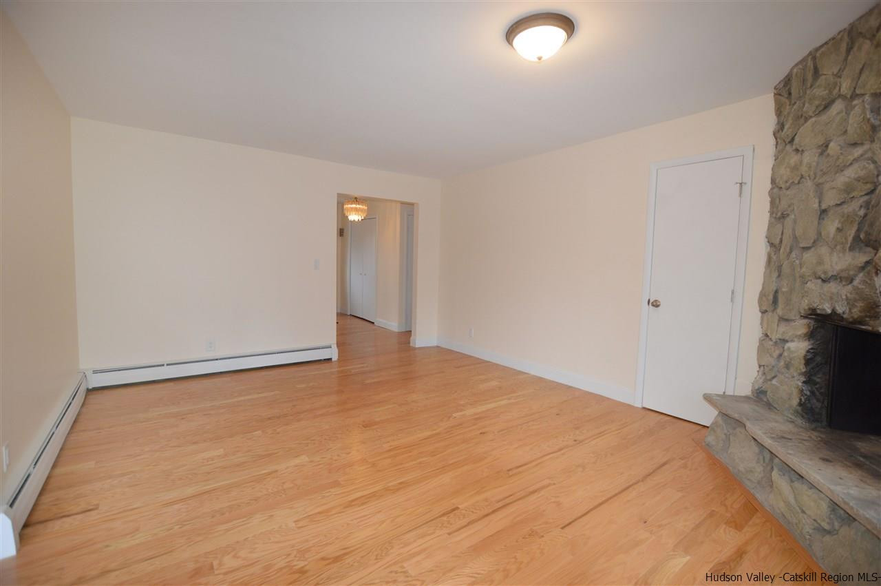 47 Roxanne Boulevard Highland, NY 12528 - Photo 3 of 24 a view of empty room with wooden floor and fan
