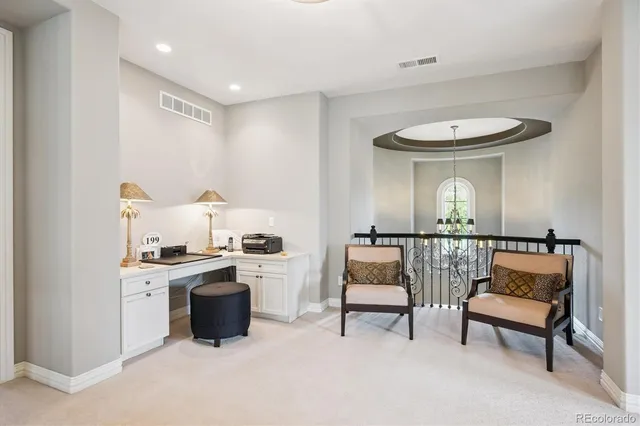 a living room with furniture and a stove