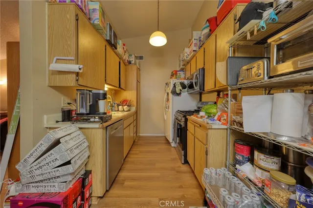 a store room with lots of different colored cloths