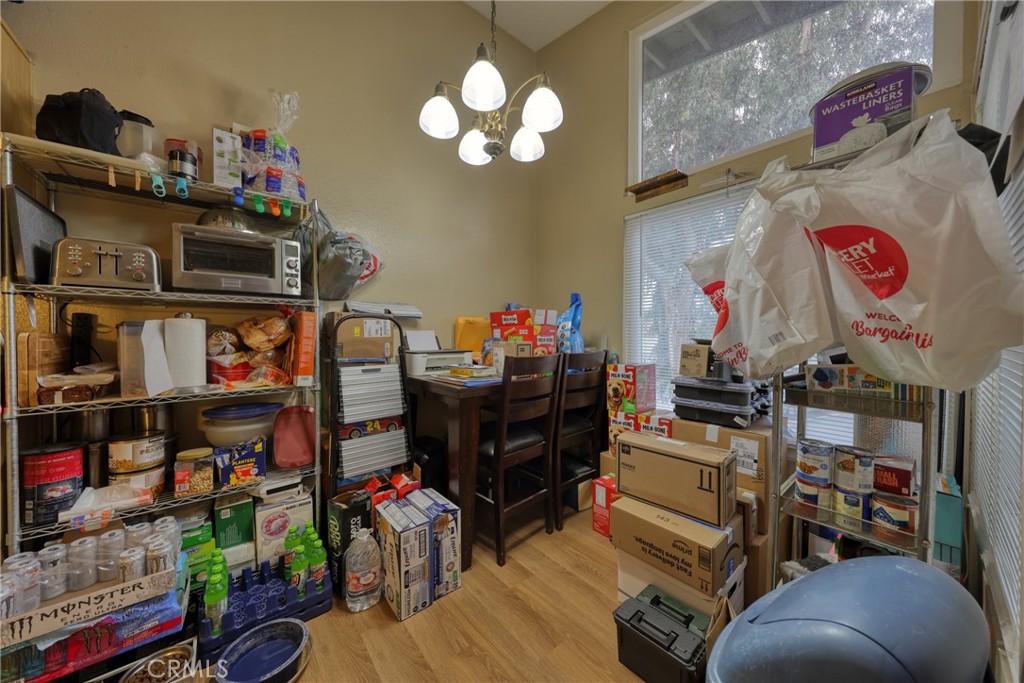 1800 East Old Ranch Road, Unit 148 Colton, CA 92324 - Photo 20 of 23 a store room with lots of different colored cloths