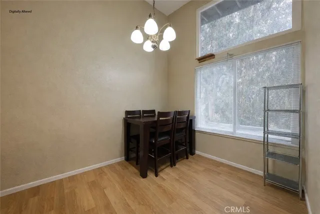 a bedroom with a bed and a night stand