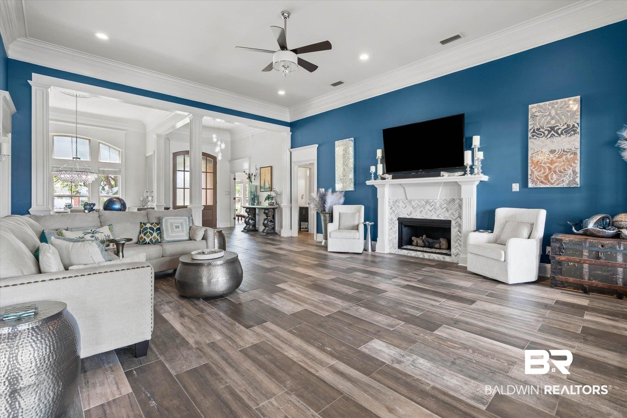 24908 Bosbyshell Avenue Daphne, AL 36526 - Photo 2 of 49 Spacious living area featuring high ceilings and a gas fireplace