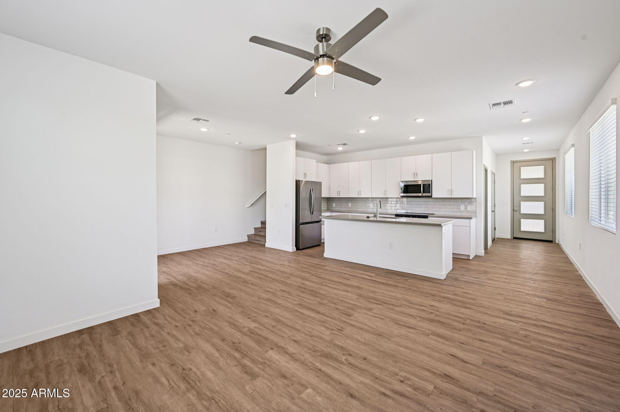 2131 East Jennifer Lynn Way Phoenix, AZ 85022 - Photo 17 of 45 a view of kitchen with granite countertop cabinets and refrigerator