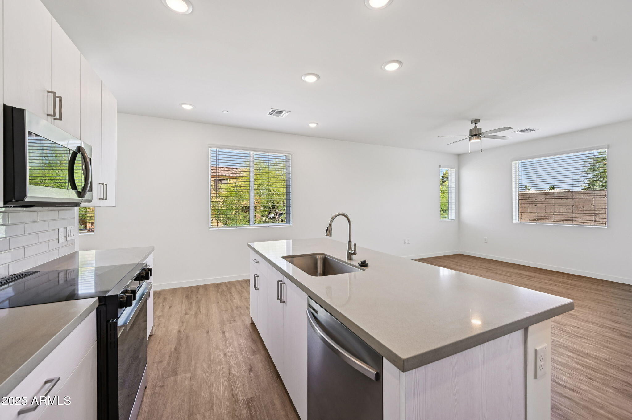 2131 East Jennifer Lynn Way Phoenix, AZ 85022 - Photo 24 of 45 a kitchen with a sink appliances and a counter top space
