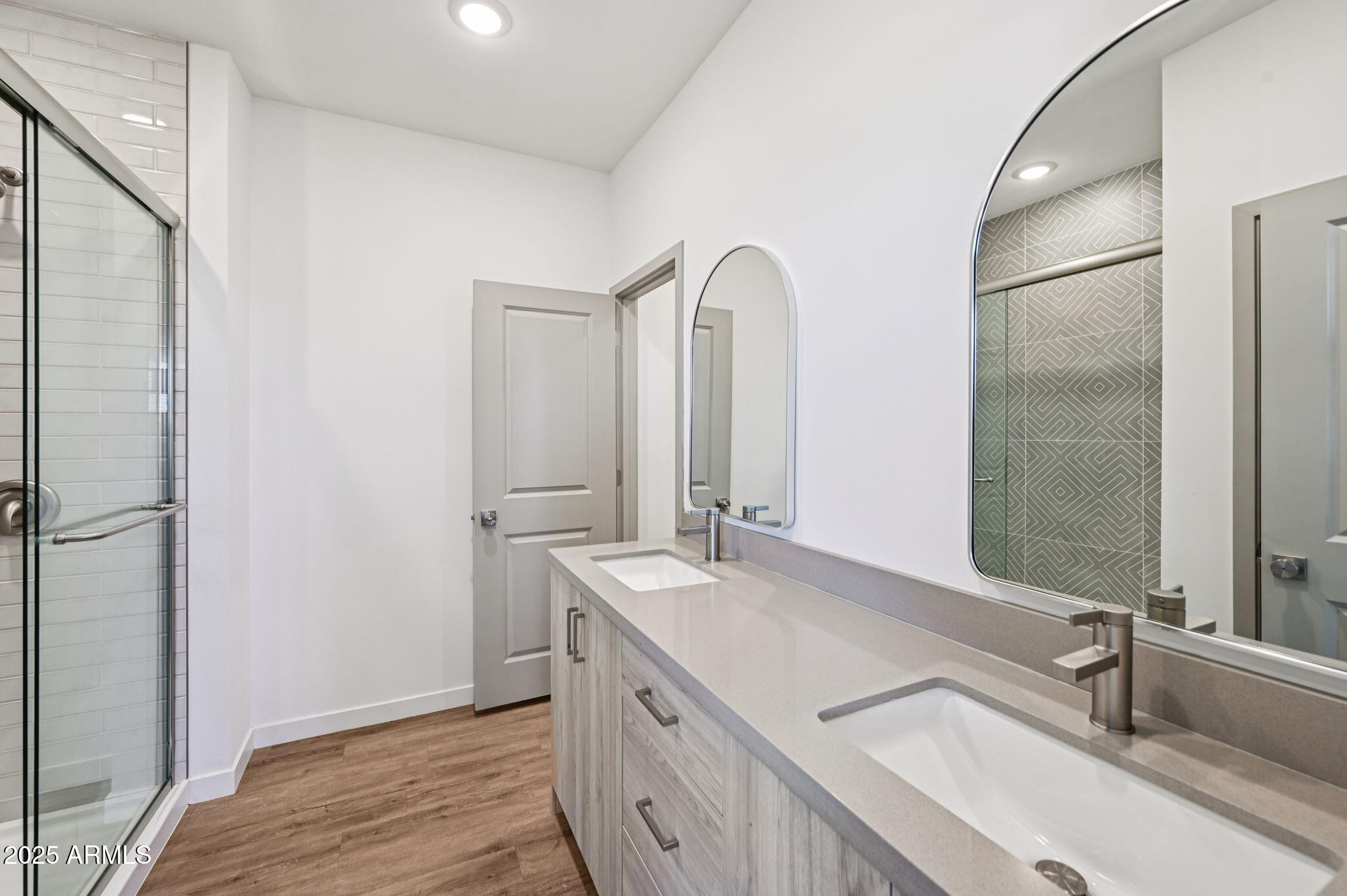 2131 East Jennifer Lynn Way Phoenix, AZ 85022 - Photo 26 of 45 a bathroom with a double vanity sink and mirror