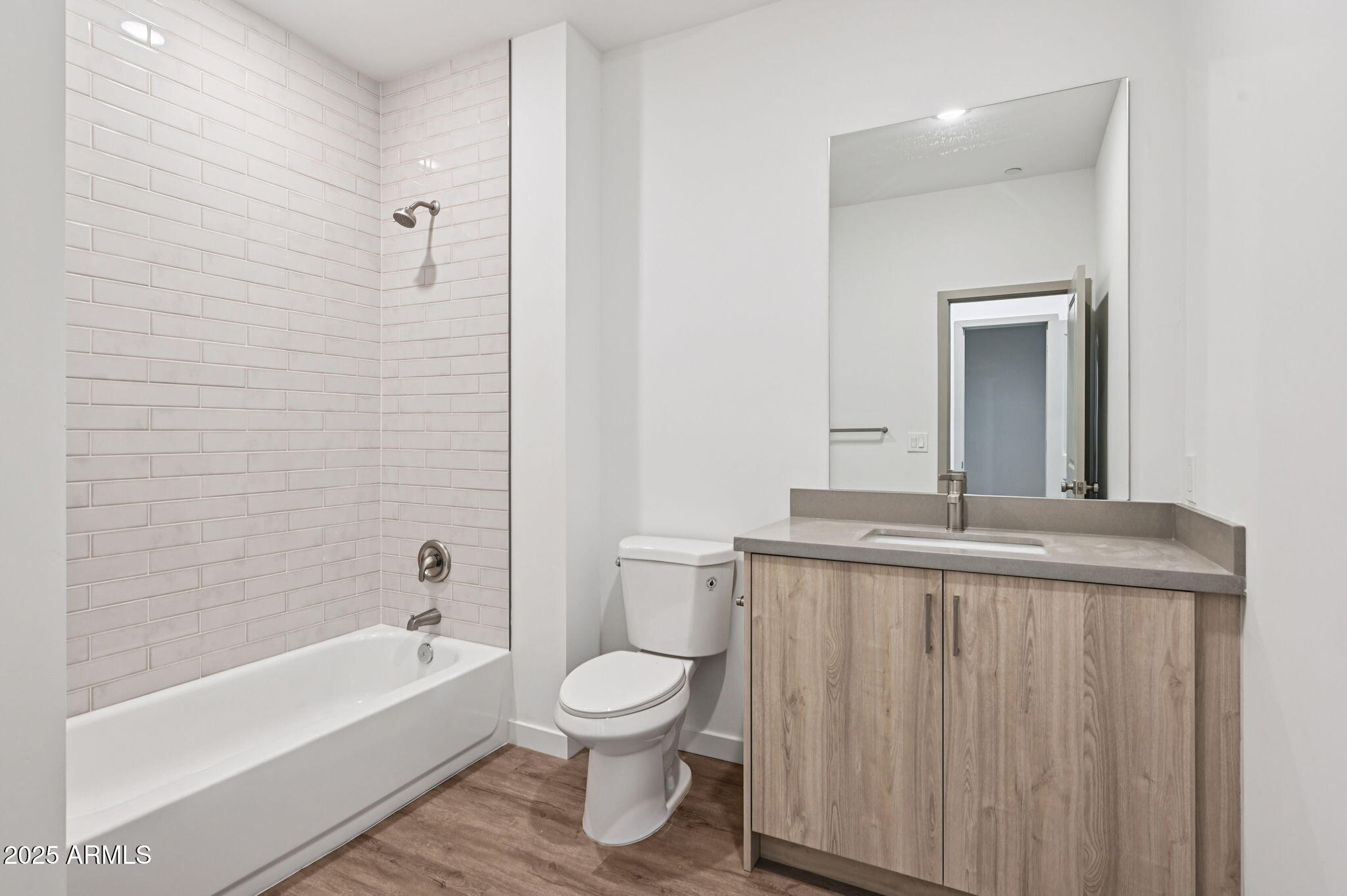 2131 East Jennifer Lynn Way Phoenix, AZ 85022 - Photo 29 of 45 a bathroom with a granite countertop sink a toilet and bathtub