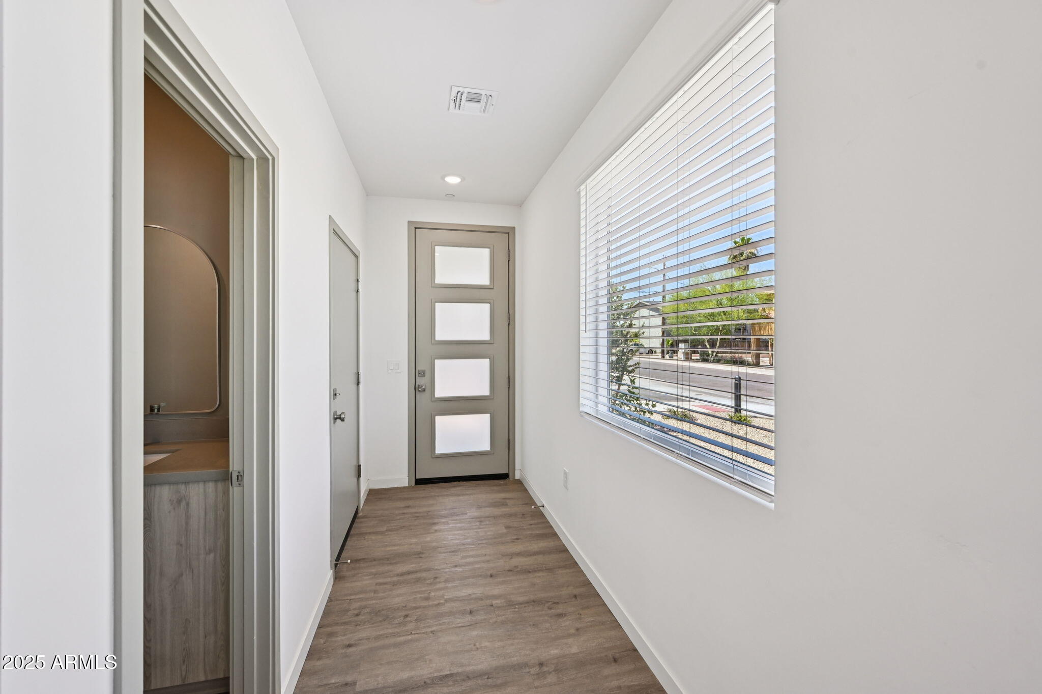 2131 East Jennifer Lynn Way Phoenix, AZ 85022 - Photo 5 of 45 a view of a hallway with windows