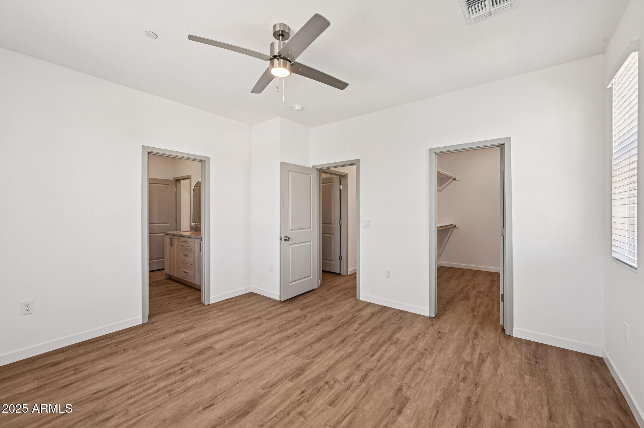 2131 East Jennifer Lynn Way Phoenix, AZ 85022 - Photo 8 of 45 a view of empty room with wooden floor