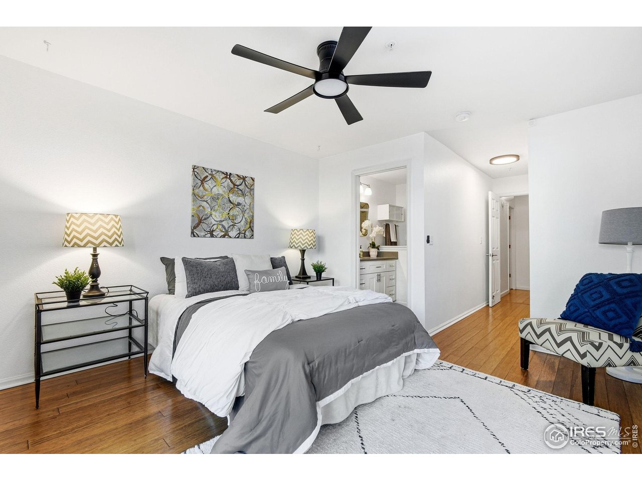 3077 29th Street, Unit 105 Boulder, CO 80301 - Photo 15 of 27 a bedroom with a bed and window