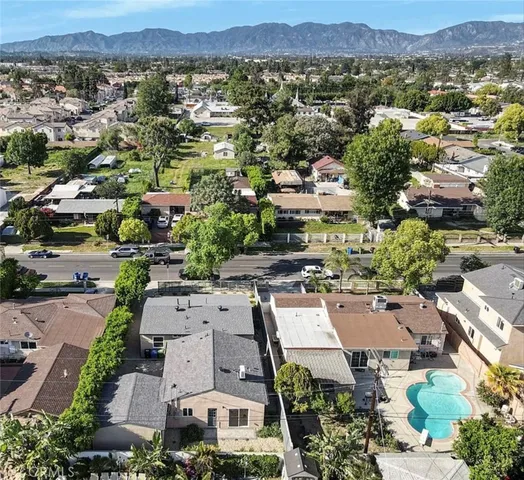a view of a dining room with furniture and window