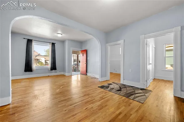 a view of an empty room and window