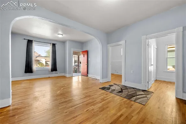 a view of an empty room and window