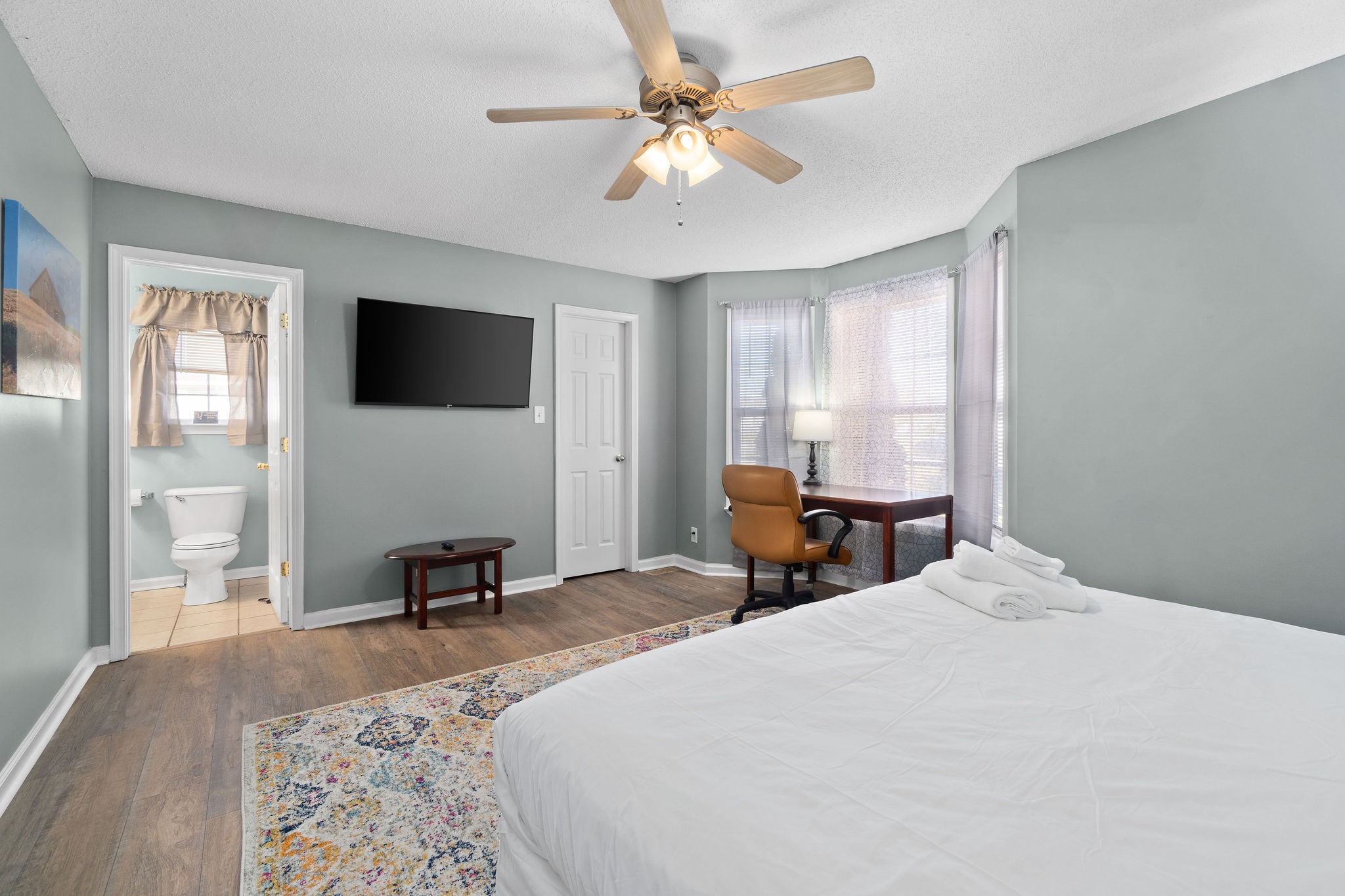 423 Filmore Road Oak Grove, KY 42262 - Photo 14 of 29 a bedroom with a bed a window and a flat screen television
