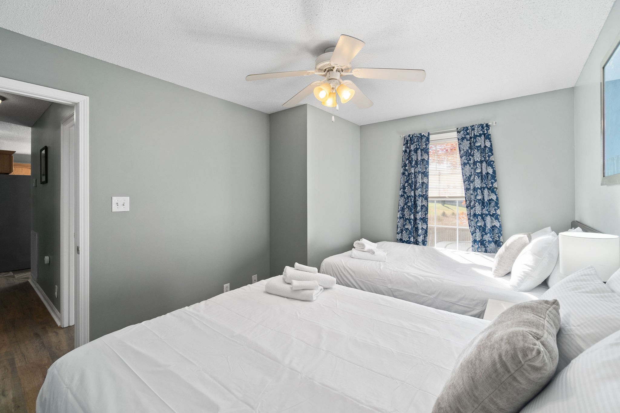 423 Filmore Road Oak Grove, KY 42262 - Photo 21 of 29 a bedroom with a bed and a chandelier