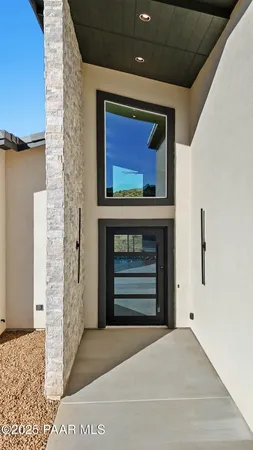 a view of balcony with wooden floor
