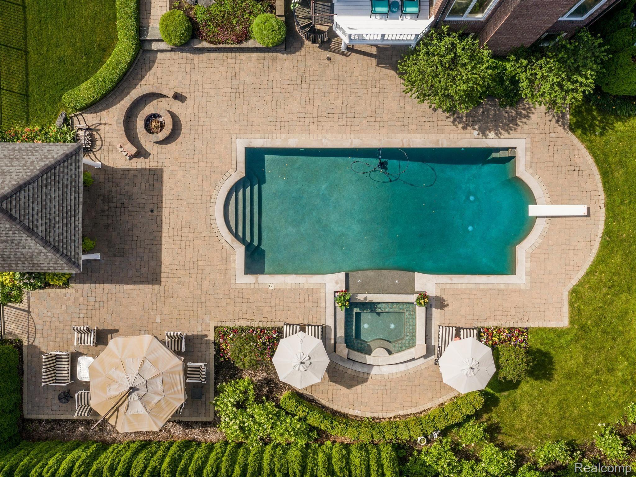 5323 Carlisle Court Rochester, MI 48306 - Photo 6 of 57 Brick pavers, pool, hot tub, and pool house