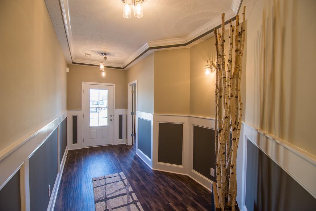 1 Beech Grove Clarksville, TN 37043 - Photo 17 of 30 a view of entryway with wooden floor and stair