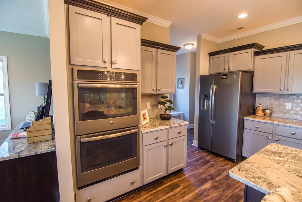 1 Beech Grove Clarksville, TN 37043 - Photo 23 of 30 a kitchen with stainless steel appliances a refrigerator stove and sink