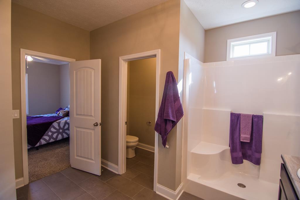 1 Beech Grove Clarksville, TN 37043 - Photo 8 of 30 a bathroom with a sink and a mirror