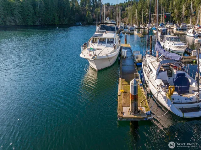 a view of a kitchen with a sink and a stove