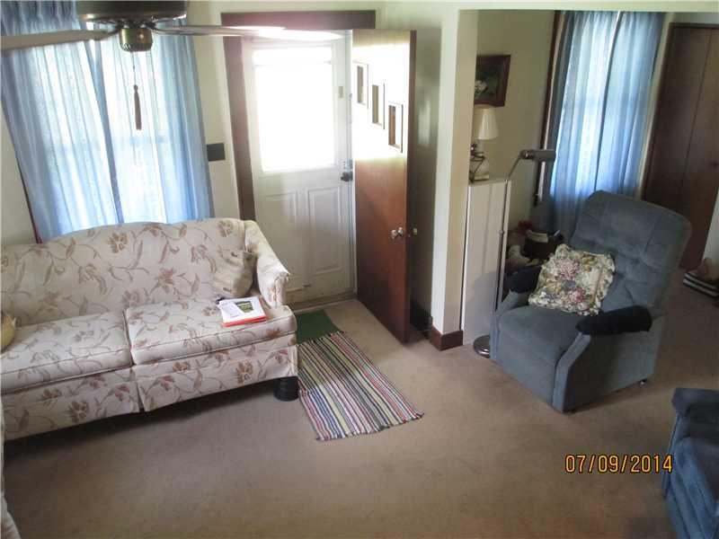 416 Kings Road Apollo, PA 15613 - Photo 13 of 20 Living Room. Entry door with screen door.