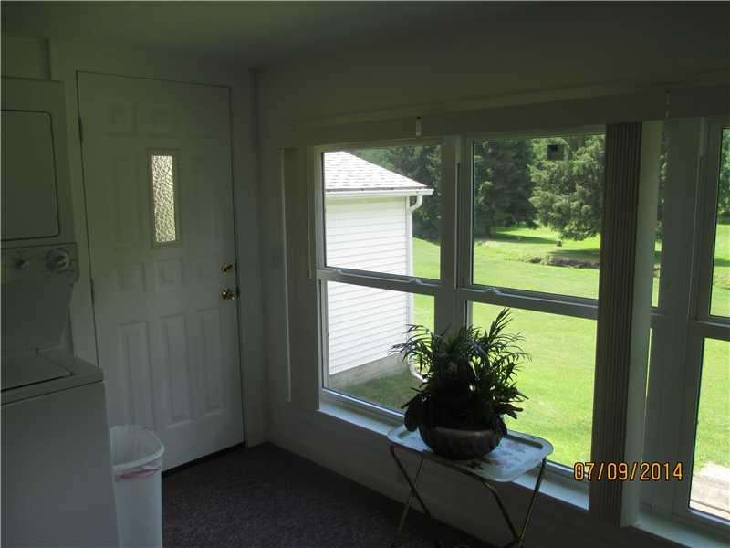 416 Kings Road Apollo, PA 15613 - Photo 9 of 20 Sunroom. New door leads off sunroom to side deck porch.