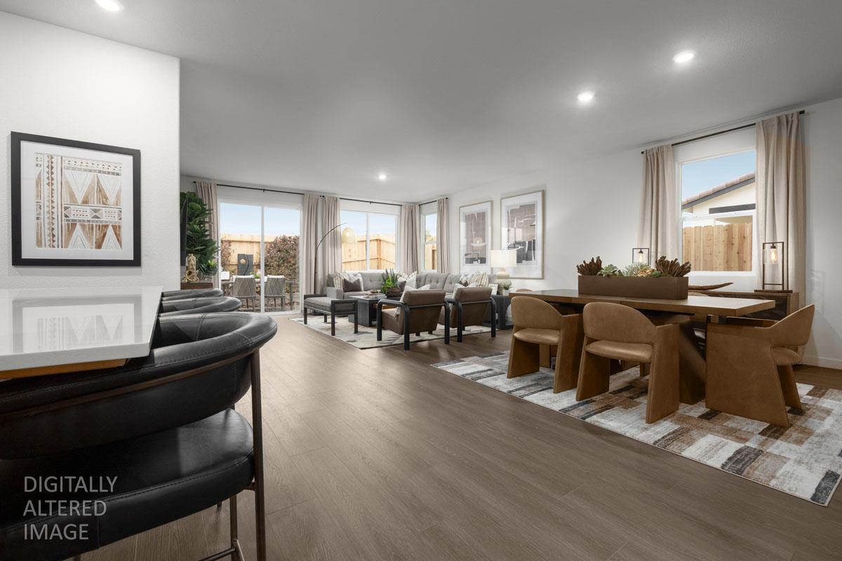 2328 Lingcod Way Rocklin, CA 95765 - Photo 3 of 6 a living room with furniture a wooden floor and a large window