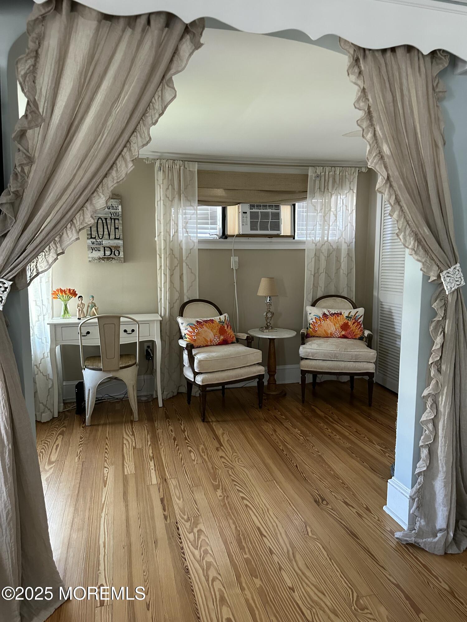 12 Surf Avenue Ocean Grove, NJ 07756 - Photo 17 of 26 a living room with furniture and a wooden floor