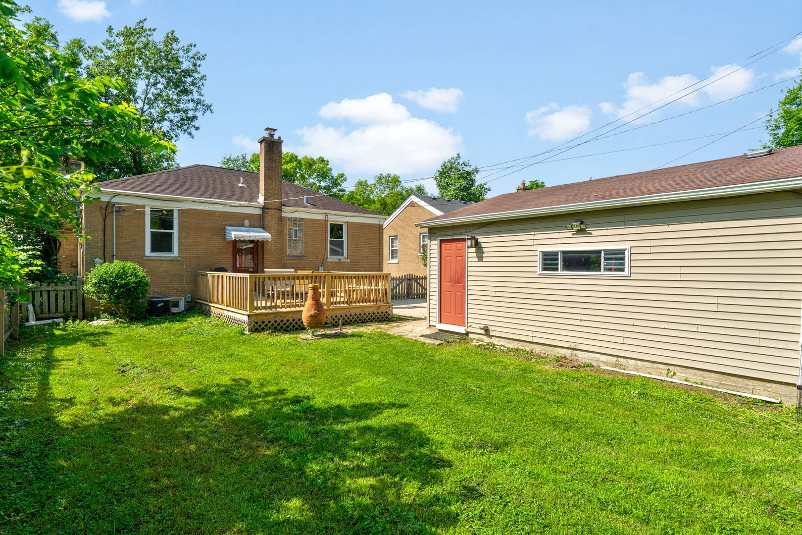 292 East Burlington Street Riverside, IL 60546 - Photo 22 of 32 a front view of a house with yard and green space