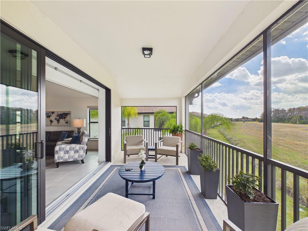5683 Mayflower Way, Unit 908 Ave Maria, FL 34142 - Photo 20 of 37 View of sunroom