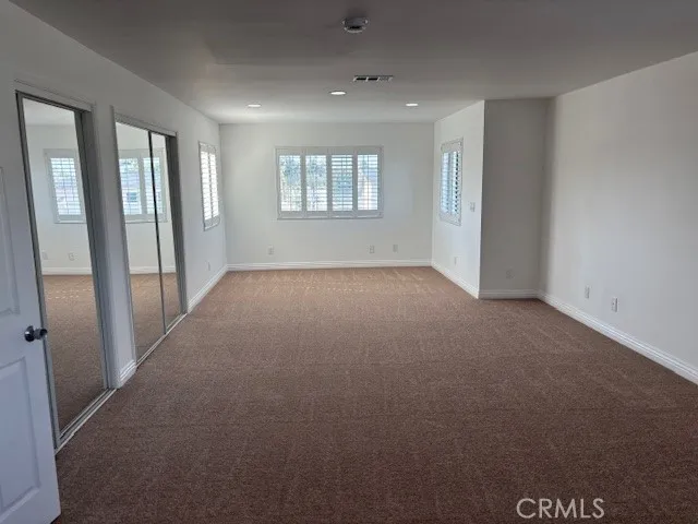 a bath room with a bath tub and a shower