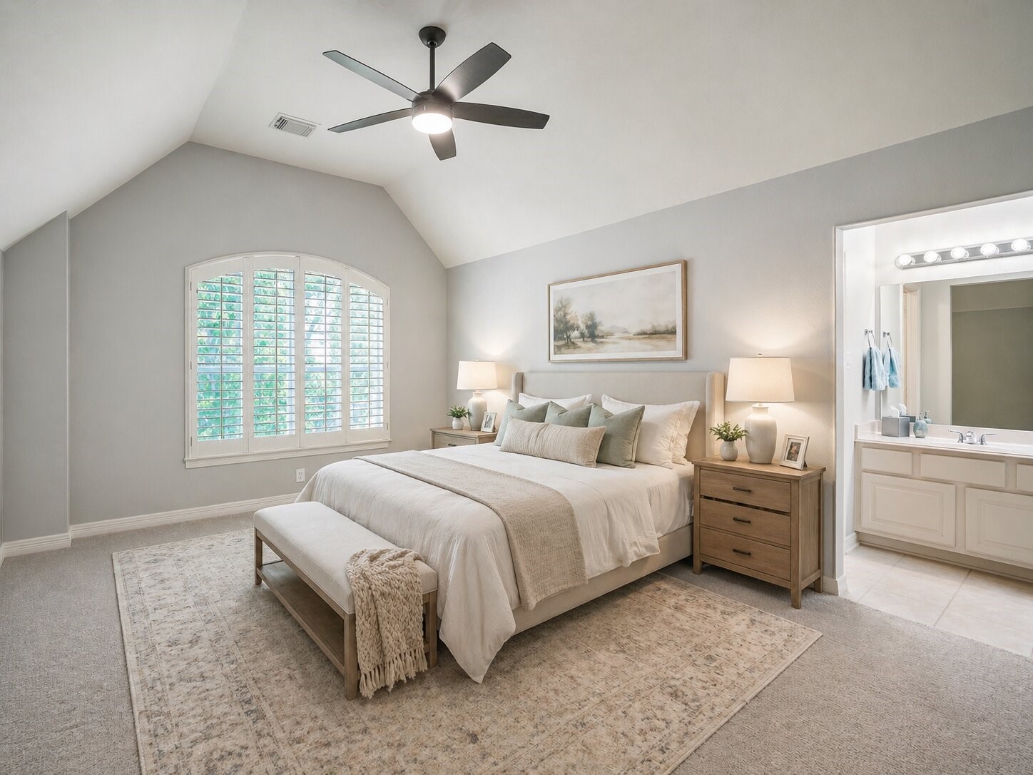9707 Blue Cruls Way Spring, TX 77379 - Photo 40 of 50 a spacious bedroom with a large bed and a chandelier