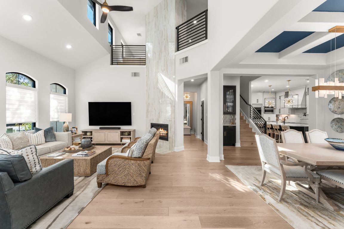 8 Hightrail Way The Hills, TX 78738 - Photo 3 of 15 a living room with furniture and a flat screen tv