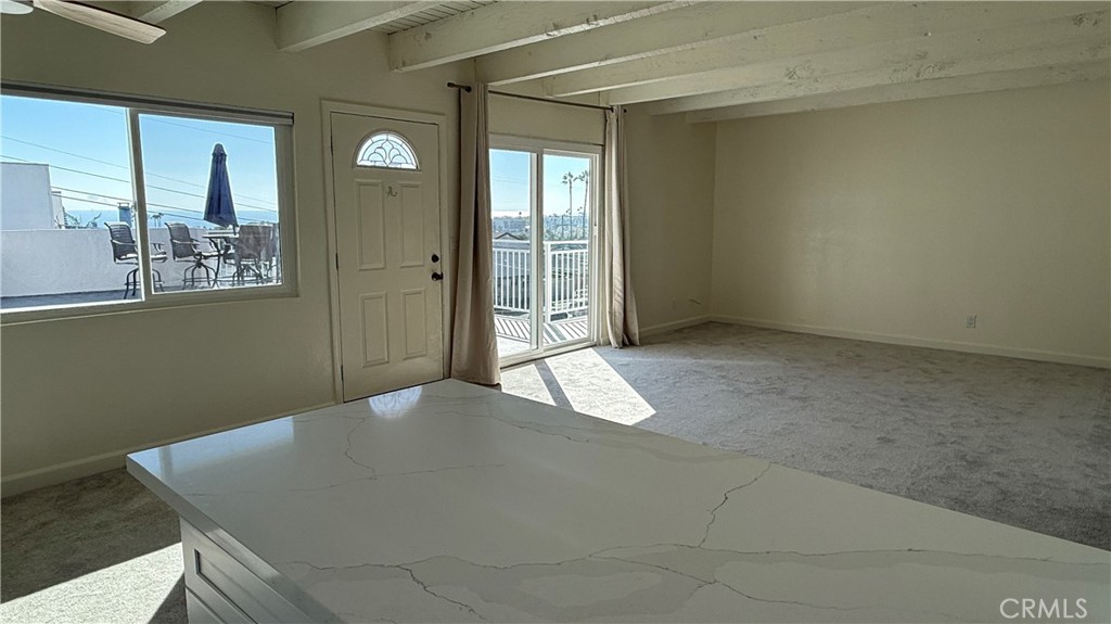 33852 Copper Lantern Street, Unit F Dana Point, CA 92629 - Photo 13 of 44 a view of an empty room with a window