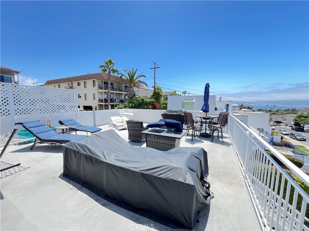 33852 Copper Lantern Street, Unit F Dana Point, CA 92629 - Photo 16 of 44 a view of roof deck with seating space