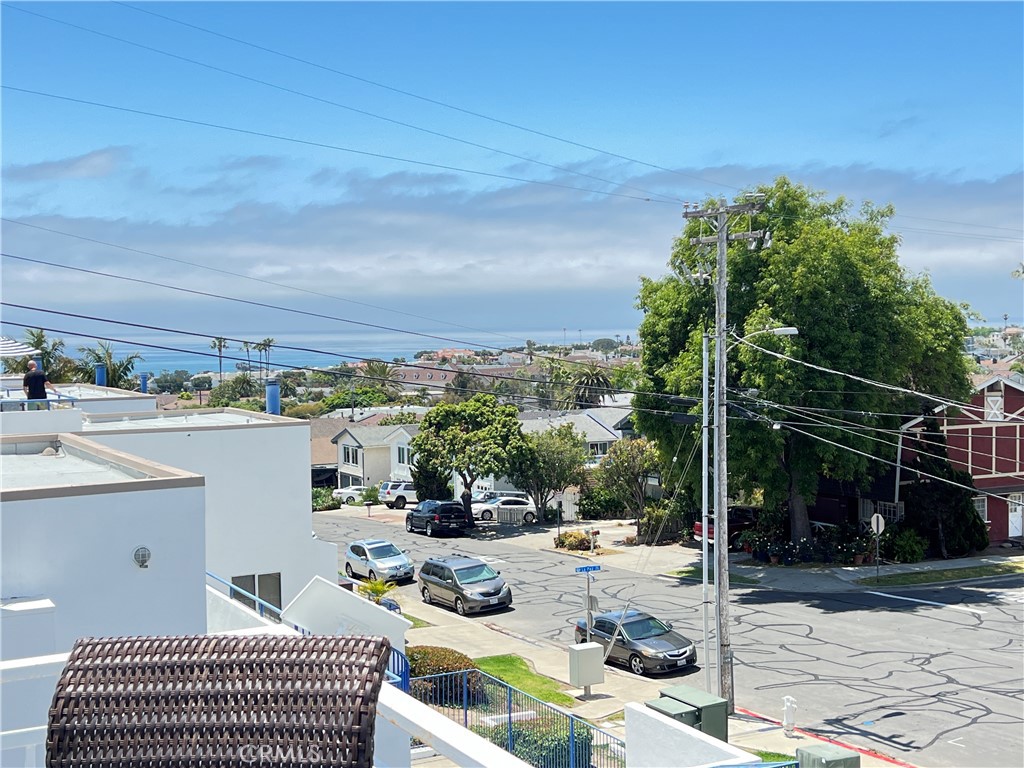 33852 Copper Lantern Street, Unit F Dana Point, CA 92629 - Photo 20 of 44 a view of a terrace with sitting area