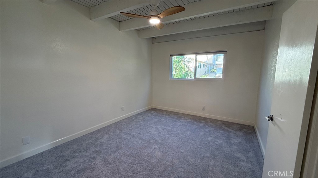 33852 Copper Lantern Street, Unit F Dana Point, CA 92629 - Photo 21 of 44 an empty room with a window