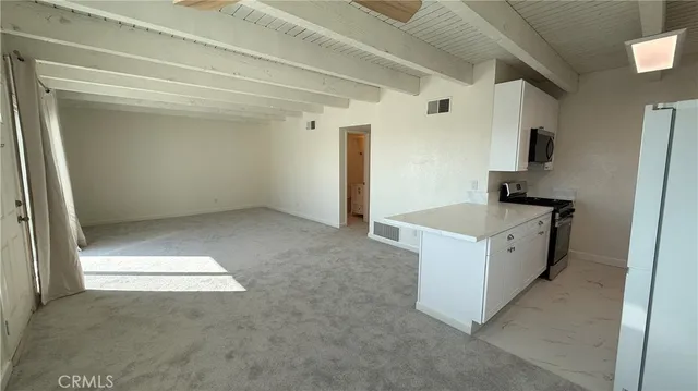 a view of kitchen with sink