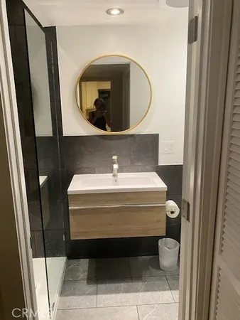 a bathroom with a toilet and a sink