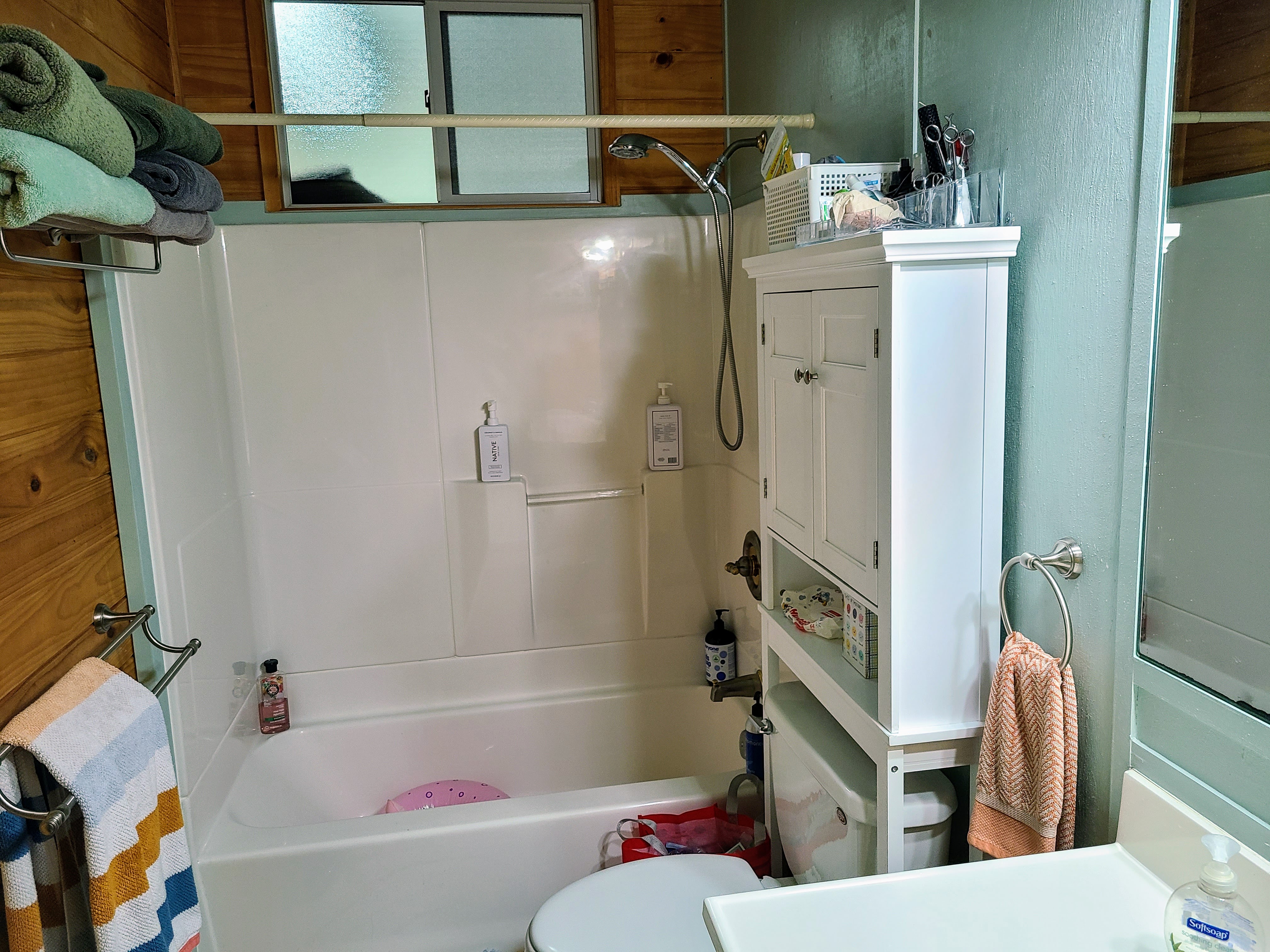 99-7721 Kilau Place Volcano, HI 96785 - Photo 16 of 28 a bathroom with a bathtub and a shower