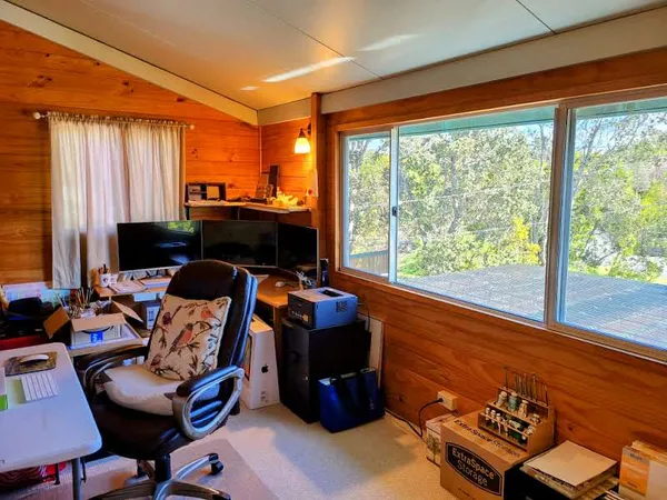 a room with furniture and a window