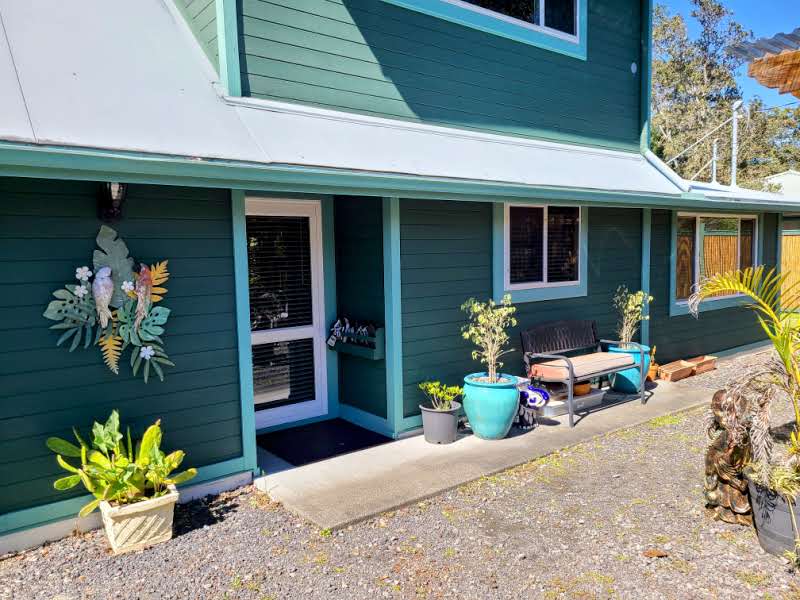 99-7721 Kilau Place Volcano, HI 96785 - Photo 20 of 28 a front view of a house with a porch