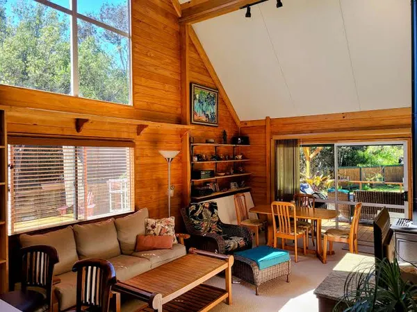 a outdoor living space with patio furniture and a potted plants