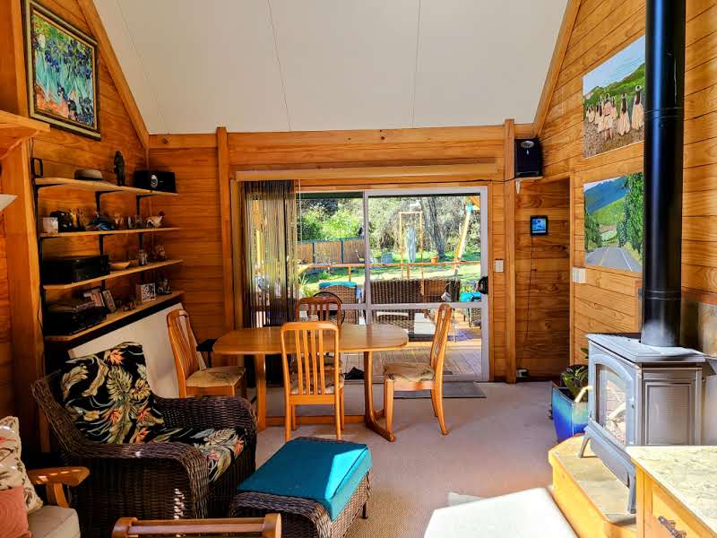 99-7721 Kilau Place Volcano, HI 96785 - Photo 6 of 28 a room with furniture and a window