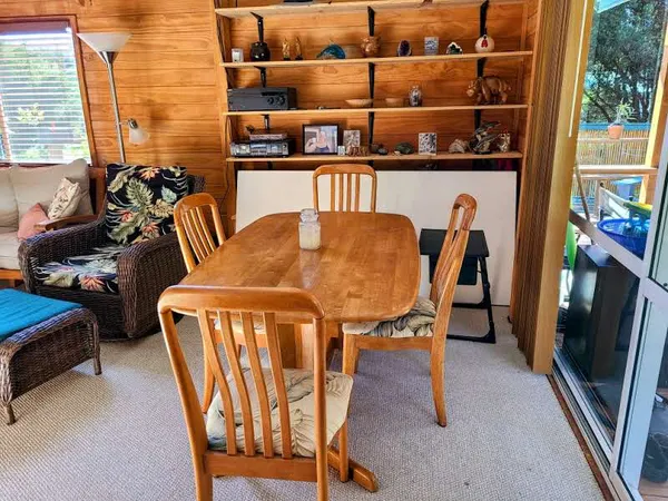 a view of a dining room with furniture