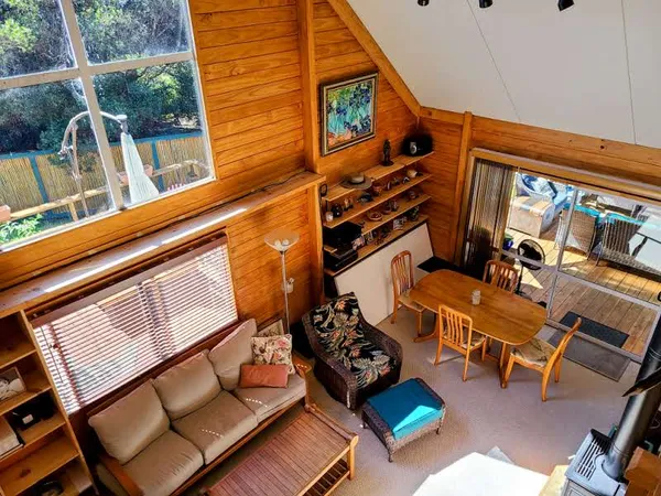 a backyard of a house with seating space