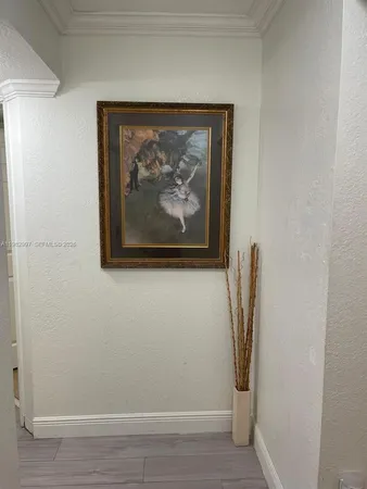 a view of a hallway with door