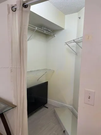 a view of walk in closet