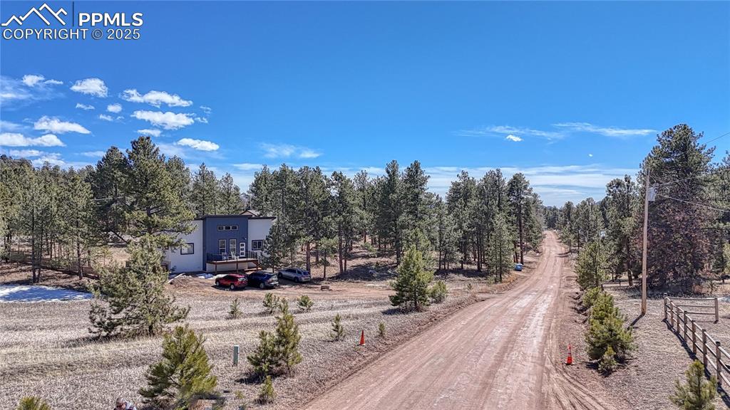 394 Due S Road Florissant, CO 80816 - Photo 11 of 28 a view of a house with a patio